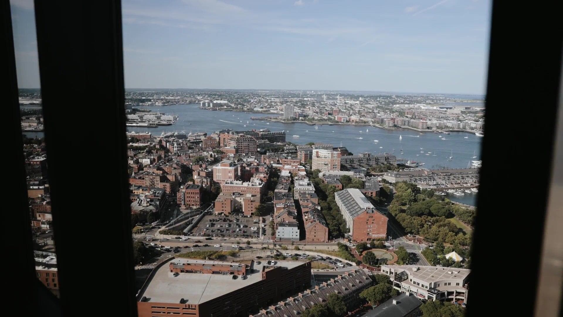 Boston’s brick streets and the harbour seen from a window of the State Room, thirty-three floors above State Street