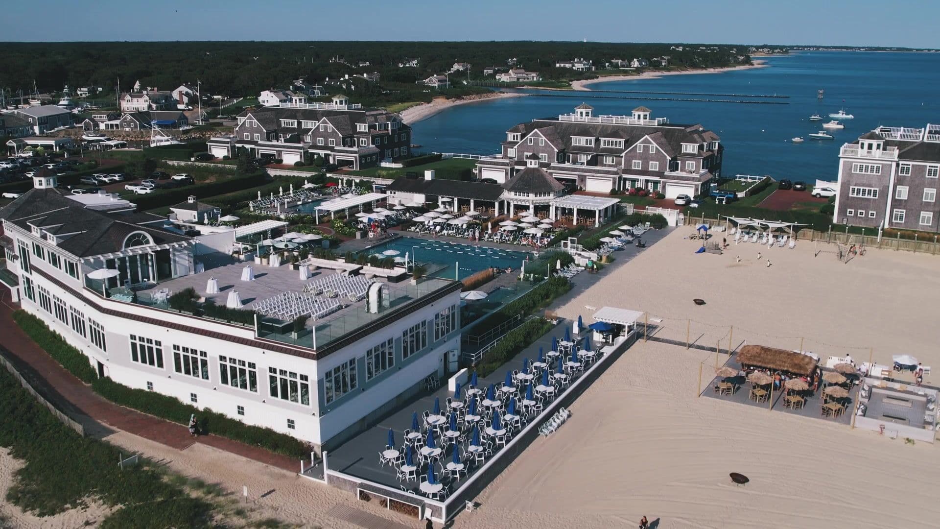 An aerial view of Wychmere Beach Club in Harwich Port, with its beach and Nantucket Sound beyond